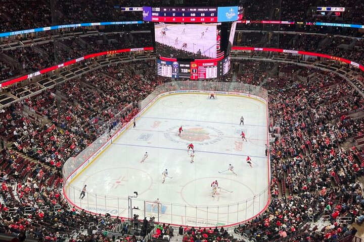 Experience the intensity of NHL hockey at the United Center where passionate fans rally behind the Chicago Blackhawks in a historic venue filled with excitement and rich tradition.